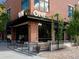 Commercial building with patio seating. Perfect for a dinner at the end of the day at 13360 W 83Rd Pl, Arvada, CO 80005
