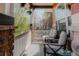 Charming front porch with comfortable seating, perfect for enjoying the outdoors at 13360 W 83Rd Pl, Arvada, CO 80005