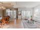 Comfortable living room featuring an entryway, large window and hardwood flooring at 13360 W 83Rd Pl, Arvada, CO 80005