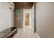 Mud room with built-in storage and a convenient bench at 13360 W 83Rd Pl, Arvada, CO 80005