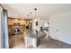 Well-equipped kitchen with stainless steel appliances, granite island, and ample cabinet space at 14245 Corrine Ct, Broomfield, CO 80023
