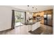 Modern kitchen featuring stainless steel appliances, granite countertops, and a breakfast bar at 14245 Corrine Ct, Broomfield, CO 80023