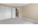 Comfortable bedroom with closet and ample space, perfect for relaxation or as a guest room with neutral carpet at 17519 E Caspian Pl, Aurora, CO 80013