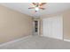 Spacious bedroom with ceiling fan and closet space at 17519 E Caspian Pl, Aurora, CO 80013
