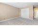 Cozy bedroom with a double-door closet and carpeted floor at 17519 E Caspian Pl, Aurora, CO 80013