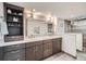 Modern bathroom with double vanity, tiled shower, and updated fixtures at 1551 Larimer St # 1901, Denver, CO 80202