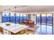 Open dining area with floor to ceiling views of the city and mountains at 1551 Larimer St # 1901, Denver, CO 80202