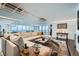Spacious living room filled with natural light, featuring stylish modern lighting and comfortable seating at 1551 Larimer St # 1901, Denver, CO 80202