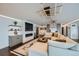 Bright and open living room with stylish lighting, modern fireplace, and a wet bar at 1551 Larimer St # 1901, Denver, CO 80202