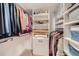 Well-organized walk-in closet offering ample storage with custom shelving and hanging space for clothes and shoes at 1551 Larimer St # 1901, Denver, CO 80202
