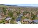 Aerial view of a well-maintained home, nestled in mature trees and landscaping in a serene neighborhood at 2665 Juilliard St, Boulder, CO 80305