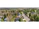 Aerial view of a home in a neighborhood featuring mature trees and landscaping, offering a peaceful suburban atmosphere at 2665 Juilliard St, Boulder, CO 80305