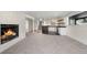 Finished basement with a fireplace, wet bar, wine fridge, and new carpet at 2665 Juilliard St, Boulder, CO 80305
