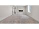 Bedroom features new carpet, a modern fireplace, and fresh paint at 2665 Juilliard St, Boulder, CO 80305