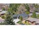 Beautifully landscaped exterior showcases a modern home with a two-car garage and manicured lawn and rock garden at 2665 Juilliard St, Boulder, CO 80305