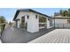 A spacious deck wraps around the house, offering multiple access points and outdoor living areas at 2665 Juilliard St, Boulder, CO 80305