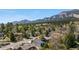 Beautiful home exterior with mountain views and mature trees surrounding the property for added privacy and shade at 2665 Juilliard St, Boulder, CO 80305