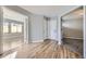 Spacious foyer featuring hardwood floors and neutral paint at 868 S Reed Ct # H, Lakewood, CO 80226