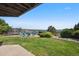 Landscaped backyard featuring a trampoline and beautiful views at 10520 W Vassar Dr, Lakewood, CO 80227