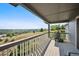 This covered balcony is ideal for reading or watching the sunset, and boasts an expansive view at 10520 W Vassar Dr, Lakewood, CO 80227
