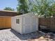 A well-maintained storage shed in the backyard offers extra space for tools and garden equipment at 4740 W Wyoming Pl, Denver, CO 80219
