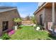The backyard features a well-maintained lawn, landscaping, and decorative accents at 501 S Race St, Denver, CO 80209