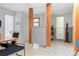 Dining room with light wood floors and accent columns at 501 S Race St, Denver, CO 80209