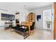 Open-concept dining room with bright light fixtures and decor at 501 S Race St, Denver, CO 80209