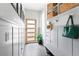 Well-organized mudroom area with bench, storage, and modern design elements at 501 S Race St, Denver, CO 80209