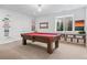 Game room featuring a pool table, decor license plates, and a comfortable, well-lit space at 501 S Race St, Denver, CO 80209
