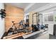 Well-equipped home gym with wooden accents, workout equipment, and plenty of space at 501 S Race St, Denver, CO 80209