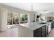 Bright kitchen boasts sliding glass doors to the outdoor dining area and marble countertops at 501 S Race St, Denver, CO 80209