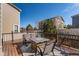 Outdoor living space with a modern deck, stylish patio furniture, and a serene ambiance at 17806 Coral Burst St, Parker, CO 80134