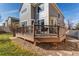 Modern outdoor deck with a comfortable seating area and a view of the backyard at 17806 Coral Burst St, Parker, CO 80134