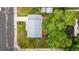 Aerial view shows large backyard, deck, landscaping, and new roof at 7912 Fenton St, Arvada, CO 80003