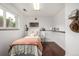 Charming bedroom with a twin bed, decorative accents, and a cozy atmosphere at 7912 Fenton St, Arvada, CO 80003