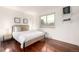 Serene bedroom with a comfortable bed, elegant decor, and ample natural light at 7912 Fenton St, Arvada, CO 80003