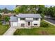 Charming two-story home featuring a well-maintained lawn, new roof, and attached garage at 7912 Fenton St, Arvada, CO 80003