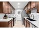 Well-equipped kitchen with granite countertops, stainless steel appliances, and ample cabinet space at 7912 Fenton St, Arvada, CO 80003