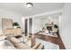 Spacious living room featuring a fireplace, comfortable sofa, and stylish decor at 7912 Fenton St, Arvada, CO 80003