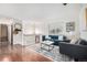 Cozy living area featuring hardwood floors, contemporary furniture, and stylish decor at 7912 Fenton St, Arvada, CO 80003