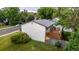 Rear aerial view showing deck, new roof, and a fenced yard at 7912 Fenton St, Arvada, CO 80003