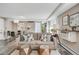Bright and open living room featuring modern decor, stylish sofa, and hardwood flooring at 1150 Vine St # 201, Denver, CO 80206