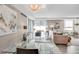 Spacious living area with dining space and modern decor, illuminated by natural light at 1150 Vine St # 201, Denver, CO 80206