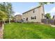 Large, well-maintained backyard with deck, lawn, and partial fencing, perfect for outdoor activities at 2753 E 139Th Dr, Thornton, CO 80602