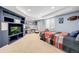Cozy basement bedroom with built-in storage, desk space, and comfortable seating at 2753 E 139Th Dr, Thornton, CO 80602