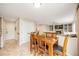 Dining room features a view of the living room, access to entry hall and stairway to the second floor at 2753 E 139Th Dr, Thornton, CO 80602