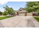 Charming two-story home boasting a large driveway, three-car garage, well-manicured lawn, and inviting curb appeal at 2753 E 139Th Dr, Thornton, CO 80602