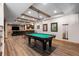 Basement featuring a pool table, bar, and entertainment area, perfect for recreation and gatherings at 5414 Golden Currant Way, Parker, CO 80134