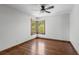 Bedroom featuring hardwood floors, natural light, and views from the corner window at 5414 Golden Currant Way, Parker, CO 80134